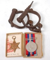 Lot 437 - A WW II 1939-45 Star and War medal in original...