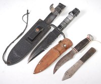 Lot 453 - A Bowie knife, the steel blade stamped Made in...