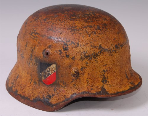 Lot 347 - A German Wehrmacht M35 steel helmet with...