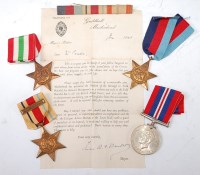 Lot 476 - A WW II group of four to include 1939-45 Star,...
