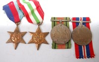 Lot 490 - A WW II group of four to include 1939-45 Star,...