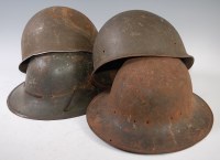 Lot 497 - A WW II M44 Brodie helmet with remains of...