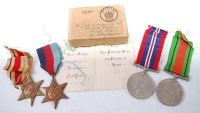 Lot 518 - A WW II group of four to include 1939-45 Star,...