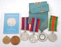 Lot 524 - A group of medals to include WW II War x2,...