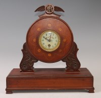 Lot 539 - A WW I period mahogany propeller mantel clock,...