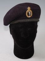 Lot 547 - A Royal Signals blue beret with badge, dated...
