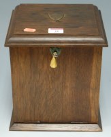 Lot 66 - An Edwardian oak stationery cabinet having a...