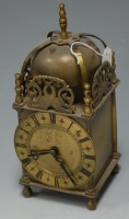 Lot 71 - *A Smiths brass cased lantern clock in the...