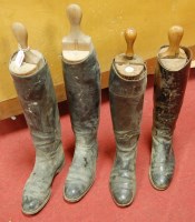 Lot 96 - *Two pairs of black leather riding boots, each...