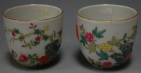 Lot 323 - A pair of Yong zheng style enamel decorated...