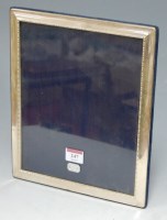 Lot 247 - A modern silver easel photograph frame, h.29cm,...