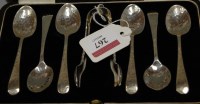 Lot 267 - A cased set of six Edwardian hammered silver...