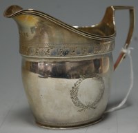Lot 270 - A George III silver cream jug of helmet form,...