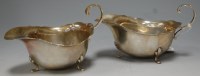 Lot 273 - A pair of Georgian style silver sauceboats,...