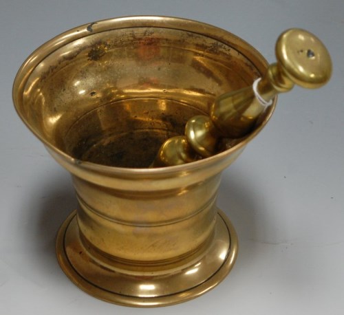 Lot 37 - A late 19th century turned brass pestle and...