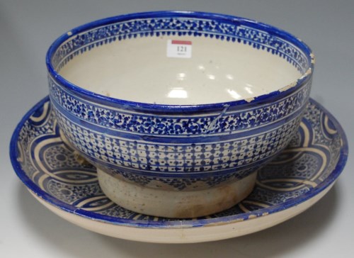 Lot 121 - *A large 19th century glazed earthenware blue...