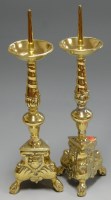 Lot 4 - A pair of brass ecclesiastical style pricket...