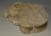 Lot 145 - A large Chinese bright jadeite carving of sea...