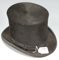 Lot 153 - An Edwardian brushed velvet top hat bearing a...