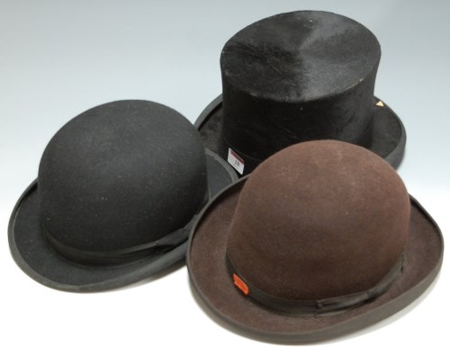 Lot 18 - An Edwardian brushed velvet top hat bearing a...