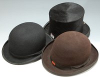 Lot 18 - An Edwardian brushed velvet top hat bearing a...