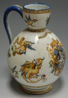 Lot 9 - *An early 20th century maiolica style pottery...