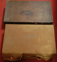 Lot 197 - An early 20th century brown leather travel...