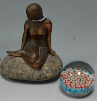 Lot 220 - A bronzed metal desk ornament of a female nude,...
