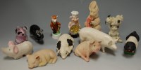 Lot 233 - A collection of novelty pigs, to include;...