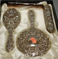 Lot 292 - A Victorian style cased silver four-piece...