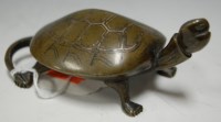 Lot 351 - A modern bronzed figure of a tortoise, w.12cm