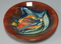 Lot 237 - A small modern Moorcroft pottery pin dish, on...