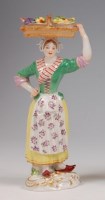 Lot 3069 - A Meissen porcelain figure 'The Fruit Seller',...