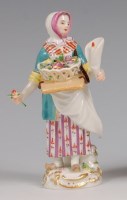 Lot 3079 - A Meissen porcelain figure 'The Candle Seller',...
