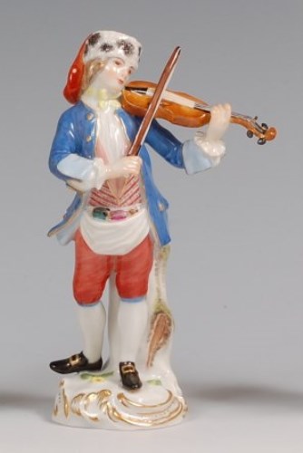 Lot 3082 - A Meissen porcelain figure 'The Ballad Seller',...