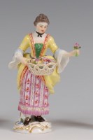 Lot 3091 - A Meissen porcelain figure 'The Flower Lady',...