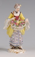Lot 3093 - A Meissen porcelain figure 'The Flower Lady',...