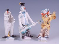 Lot 3109 - A Meissen porcelain three-piece clown...