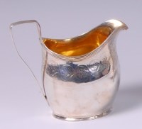 Lot 3161 - A George III silver helmet shaped cream jug,...
