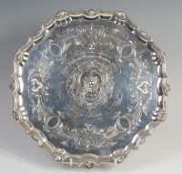 Lot 3176 - A George II silver salver, having shell cast...