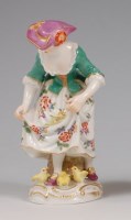 Lot 3089 - A Meissen porcelain figure 'Girl feeding...