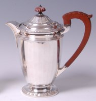 Lot 3230 - A George V silver hot water jug, of fluted...
