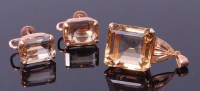 Lot 3244 - A yellow metal and citrine set pendant, the...