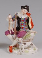Lot 3114 - A Meissen porcelain figure of a seated...