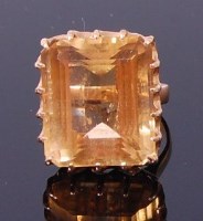 Lot 3250 - A modern 18ct gold and citrine set dress ring,...