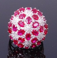 Lot 3252 - An 18ct white gold, ruby and diamond cocktail...