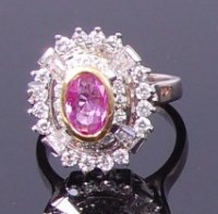 Lot 3269 - A contemporary white metal, pink sapphire and...