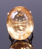 Lot 3271 - A modern yellow metal and citrine dress ring,...
