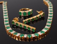 Lot 3285 - An Indian 20ct gold, emerald and diamond...