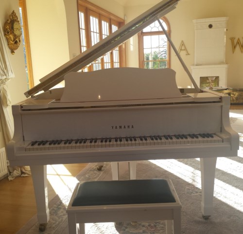 Lot 3652 - A contemporary Yamaha baby grand piano, in...